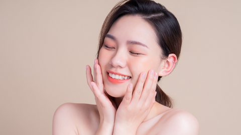 Happy woman with glowing skin